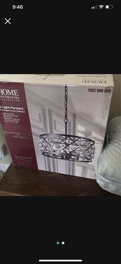 Hanging light fixture with Crystals and bronze Colo