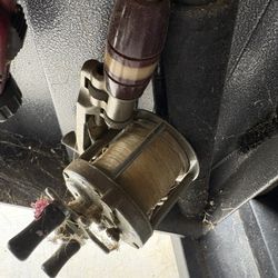 Old Metal Fishing Rod And Real