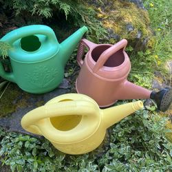 3 Vintage Watering Cans . 