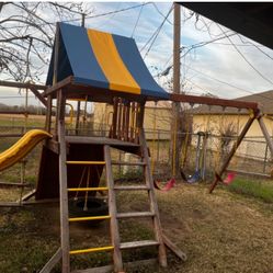 Playcenter w/tarp, Rock wall, And Swings