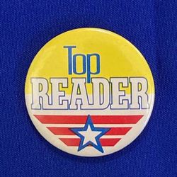 Vintage 1980s Top Reader pinback button pin with Top Gun movie design 