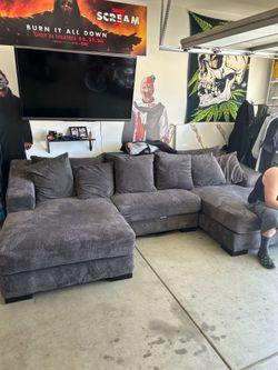 Deep sectional grey couches