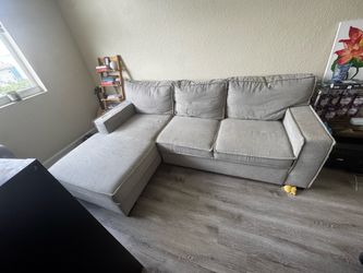 Sectional pull out bed with storage