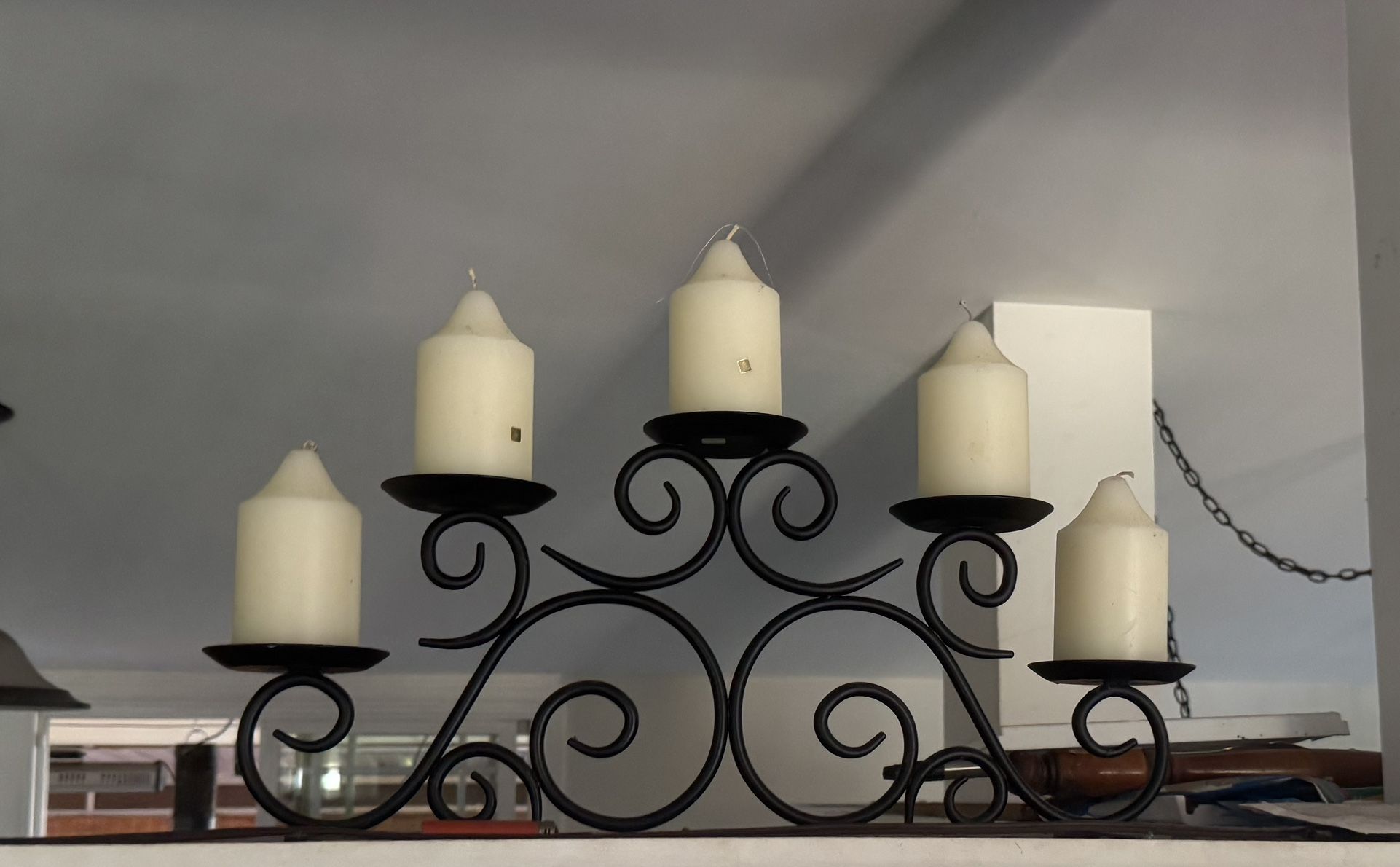 candelabra 5 arm candle holder with 5 cream colored candles 