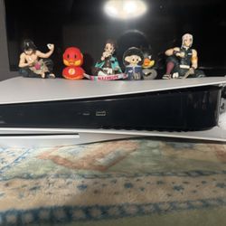 PS5/CONTROLLERS AND CHARGING STAND/GAMES INCLUDED