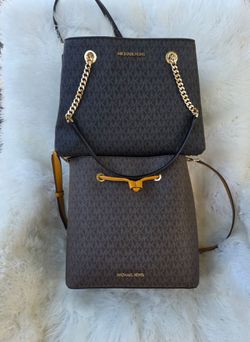Mk Originales $170, por las dos.