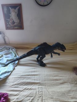 The dinosaur is really cool and a bit realistic it is not broken it is so big and the tail can come of if you take it of