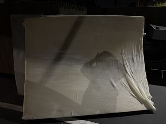 Two Queen-size foam mattresses. 