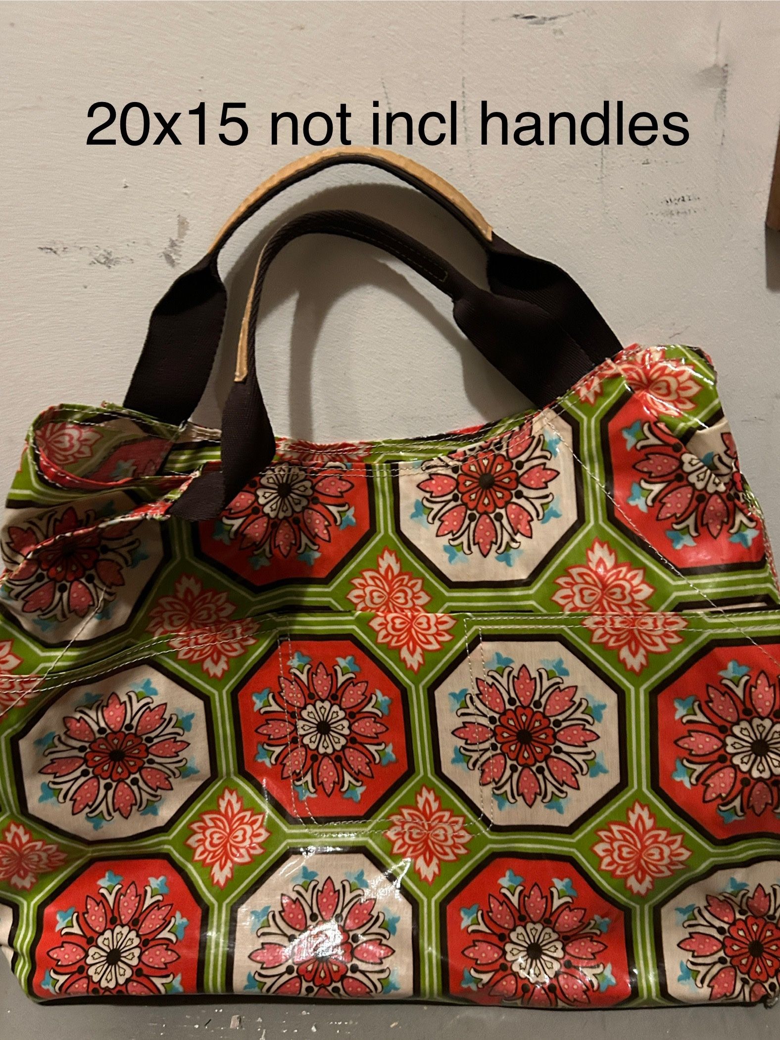 Beautiful reusable bag/tote, carry all has clasp, outside pocket, inside zip section&slit pocket