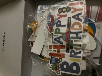 Assorted kids birthday decor mostly vehicles