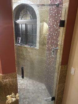 Frameless Glass Shower Door with Black Hardware