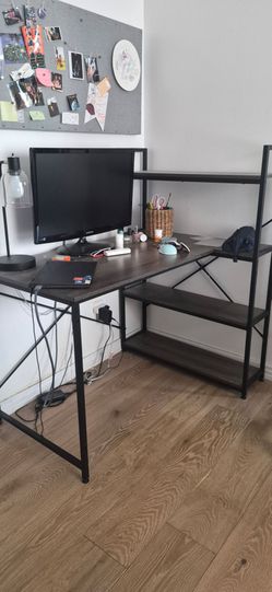 Two desks one right corner other left