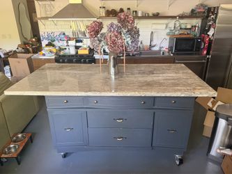 Custom made marble top kitchen island on wheels