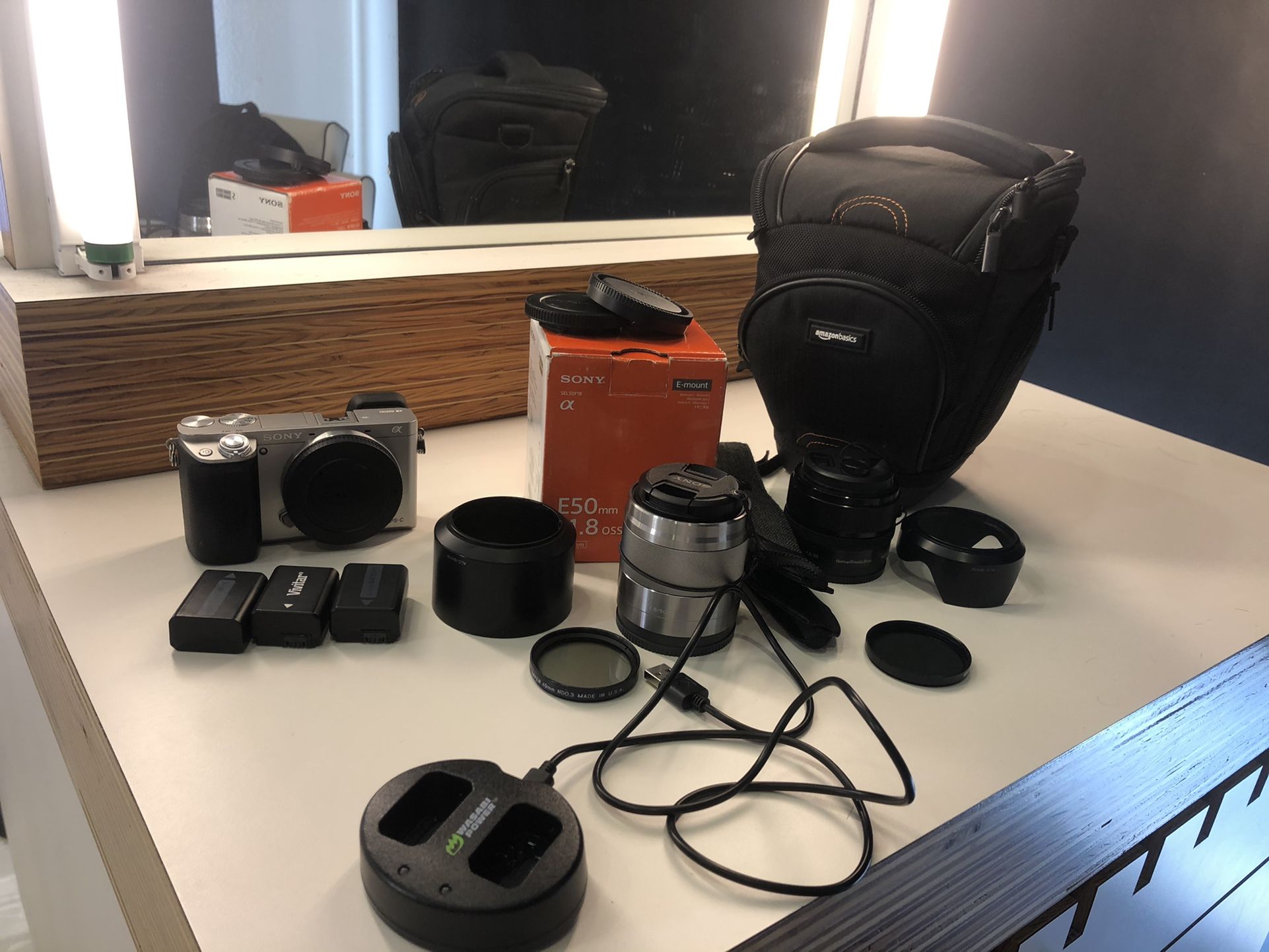 Sony a6000 with 50mm and 35mm lenses and accessories