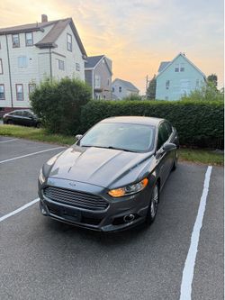 Ford fusion titanium 2014 clean title in hand