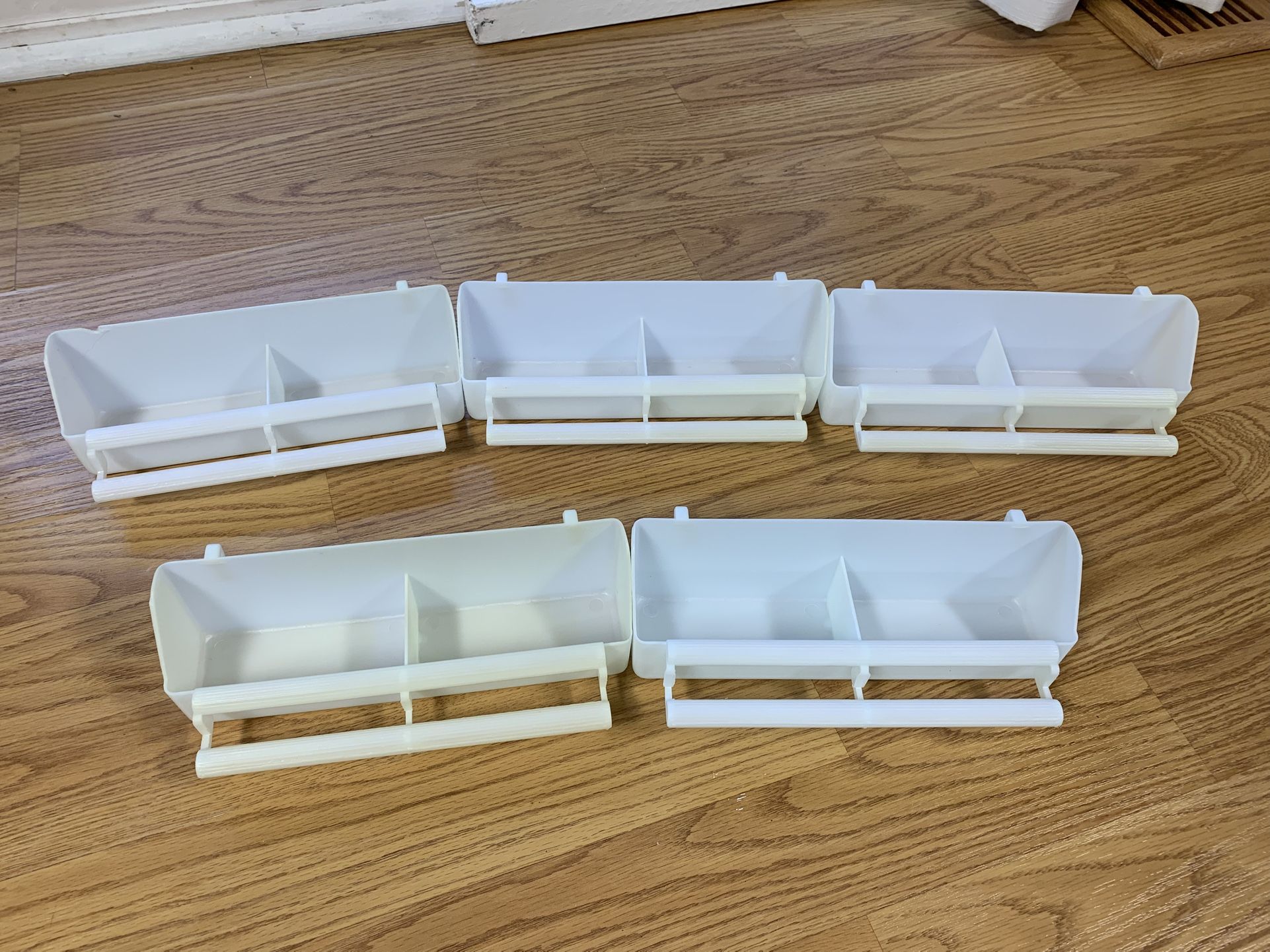 Multiple White Bird Feeders