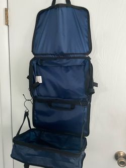 Two expandable navy toiletry bags
