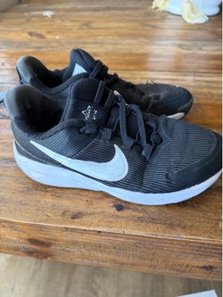 Black Nikes size 2