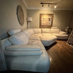Leather sectional couch w ottoman