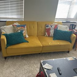 Yellow futon couch (6 1/2 ft long)