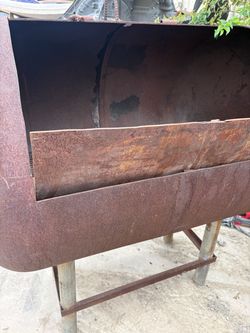Large custom-built heavy steel barbecue pit