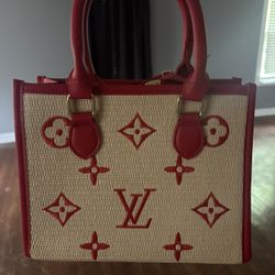 Red Hand Bag One Has Shoulder Strap The Other Doesn’t!