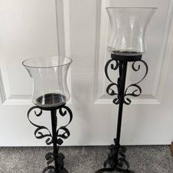 2 metal candlesticks, both for $30