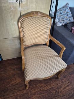 Vintage French provincial carved wood armchair