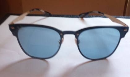 RAY BAN'S HEXAGONTLE SHADES 