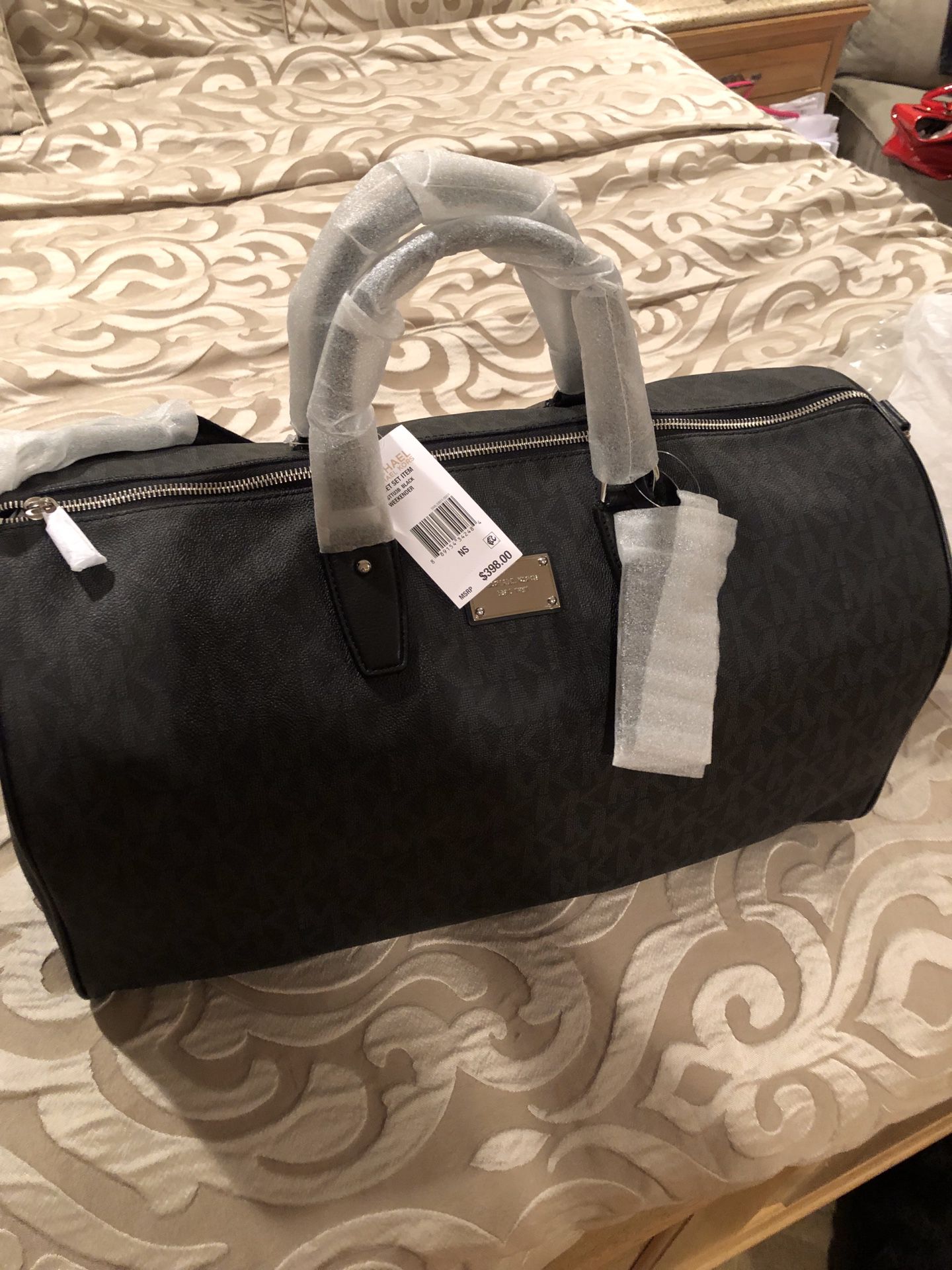 Brand new Michael kors travel bag