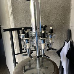 6 Bottle Rotating Bottle Dispenser 