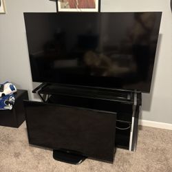 65” Samsung tv And Surround. Free Tv Stand And Smaller Tv