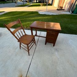 Wood chair & writing desk 26”T 34”L 20”D with wood grain & stack of three side drawers
