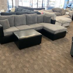 New Black And Grey Sectional And Ottoman 