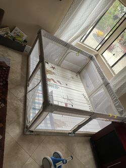 Large playpen/ fenced in play area.