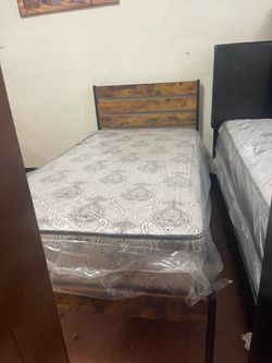 New twin bed with new mattress included