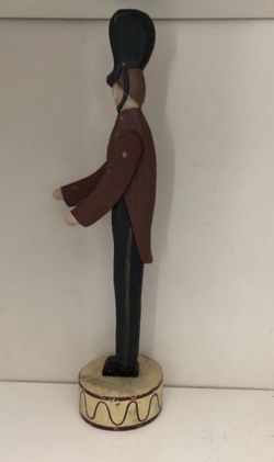 Americana Patriotic Wooden Soldier on Round Base. 16 inches tall with 4 inch diameter base