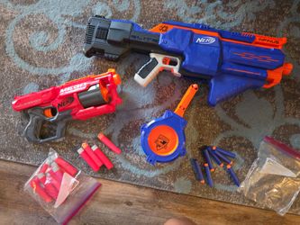 Pair of Nerf guns with darts