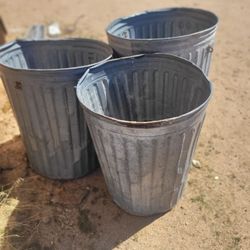Large metal trash can $5 each has rust spots bottom no handles great for wood storage