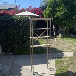 Bathroom  rack with four shelves beautiful style good condition clean  size H64.5” W24” D7”