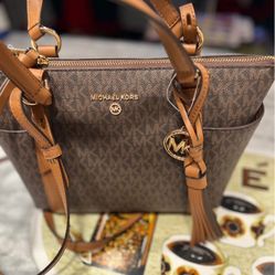 New with Tags Michael Kors Handbag with straps. 12” L x 9 H x 5 D