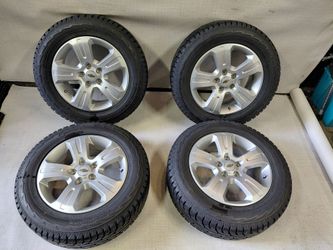 Set of ready to bolt on Chevy Captiva on studded tires