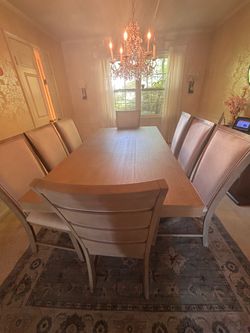 Cosmopolitan 9-pieces extendable dining table with chairs gray upholstered