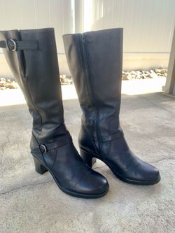 Black leather knee-high Dansko boots