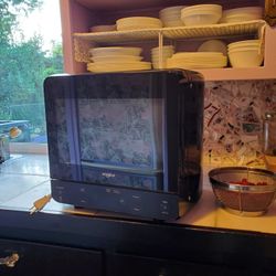 Like New Whirlpool Black Space Saving Microwave