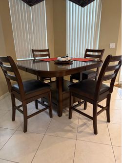 Dinette  table and 4 chairs
