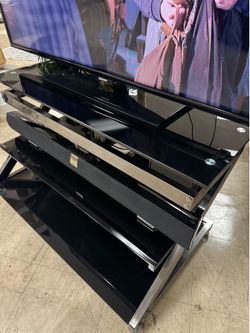 TV stand audio bar plus TV on clearance
