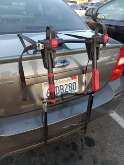 One Bicycle Carrier Mounts On Your Trunk