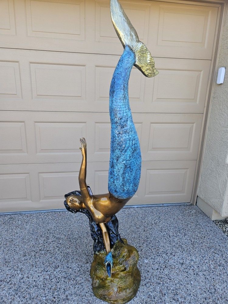 bronze mermaid fountain