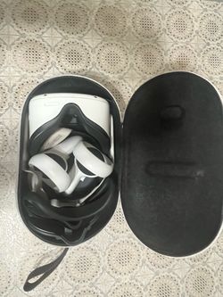 Meta Quest 2 VR Headset with controllers and case